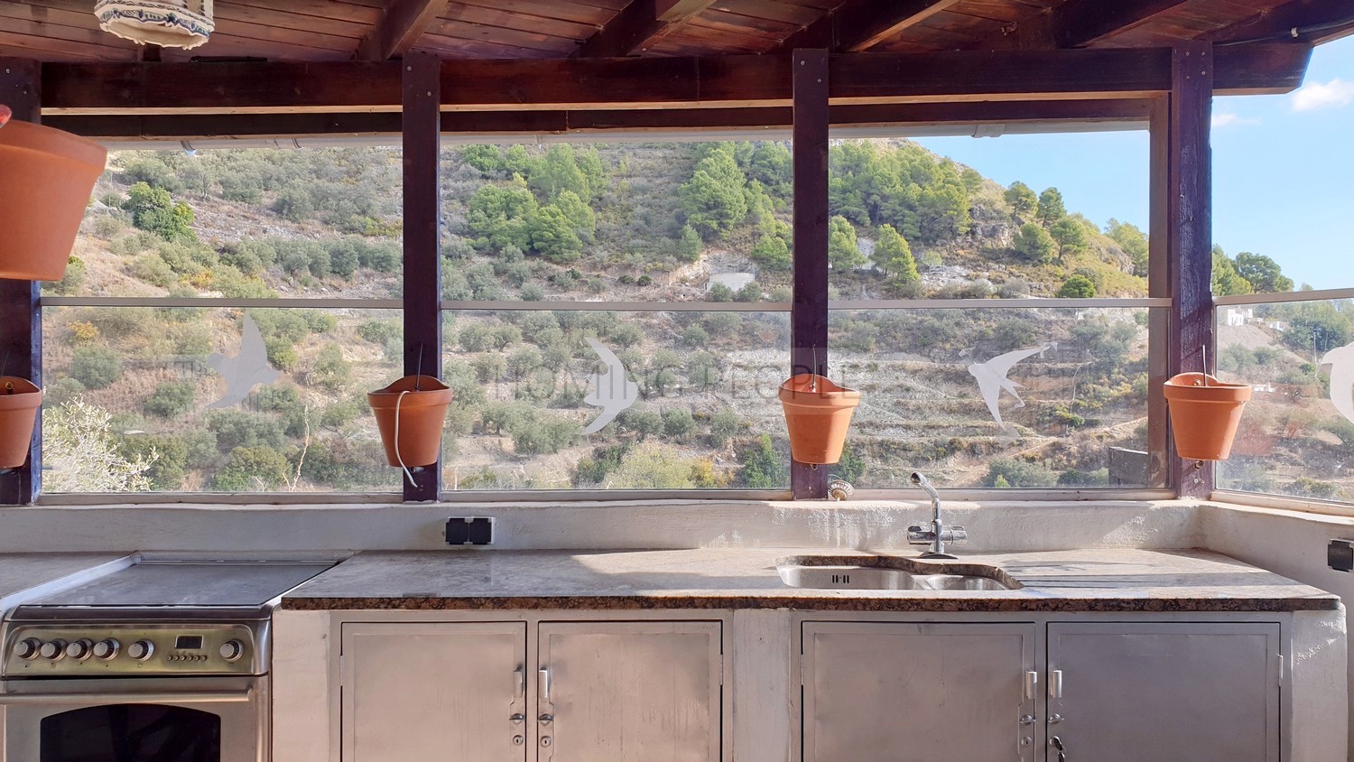 Un cortijo encantador con vistas panorámicas a la montaña